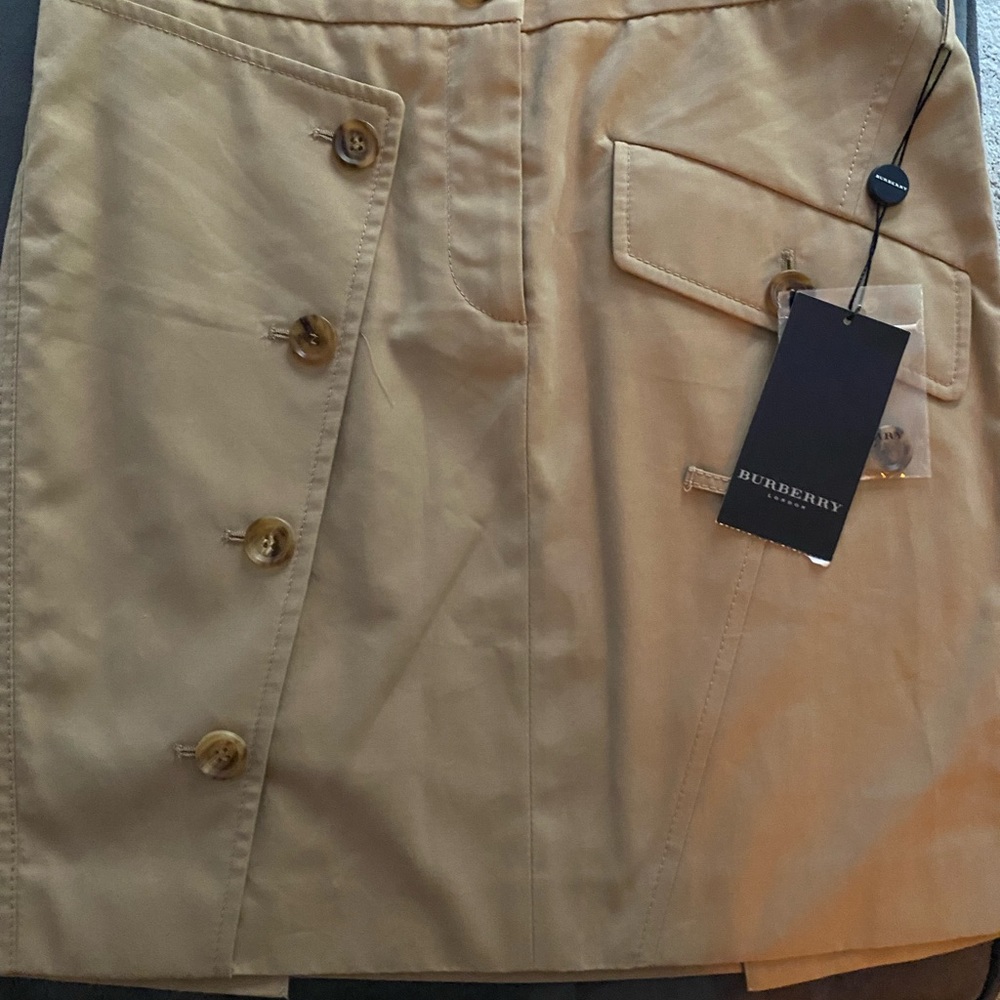Front button Burberry skirt. New with tags.